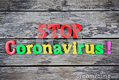 Stop coronavirus word written on wood block Stock Photo