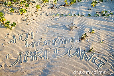 Stop dreaming start doing! Creative motivation concept. Stock Photo