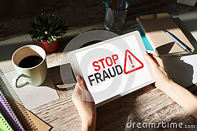 Stop Fraud banner on screen. Cybercrime and internet security concept. Stock Photo
