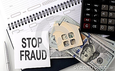 STOP FRAUD - the inscription of text on the sticker on planning with dollars and calculator Stock Photo