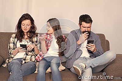 Stop ignoring kid. Stuck in online. Ignored child. Busy parents surfing internet smartphones. Dad and mom ignoring Stock Photo