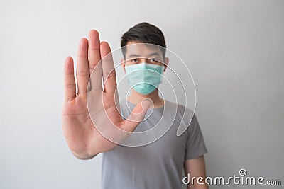 Stop the infection! Healthy man showing gesture Stock Photo