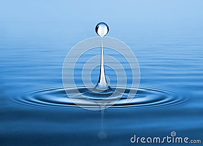 Stop motion of droplet on water surface creating wave in the sea Stock Photo
