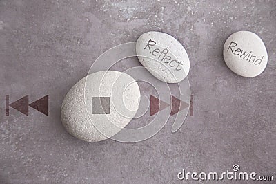 Stop reflect rewind zen stones Stock Photo