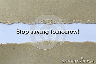Stop saying tomorrow on paper Stock Photo