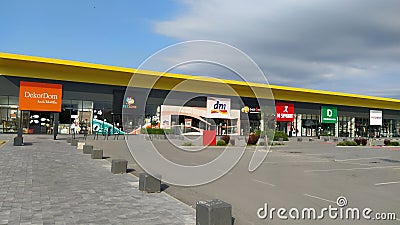 Stop shop shopping center, Sremska Mitrovica, Serbia, June 06, 2022. Square with open shops dm, intersport, dekordom Editorial Stock Photo