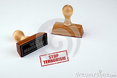 Stop terrorism. Rubber Stamper with Wooden handle Isolated on White Background Stock Photo