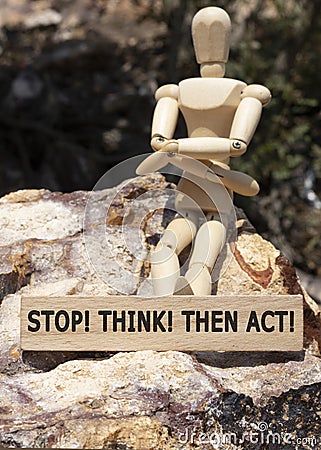 Stop Think Then act Written on wooden surface Stock Photo