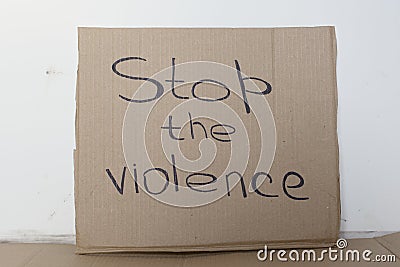 Stop the violence cardboard sign. The concept of the world without violence Stock Photo