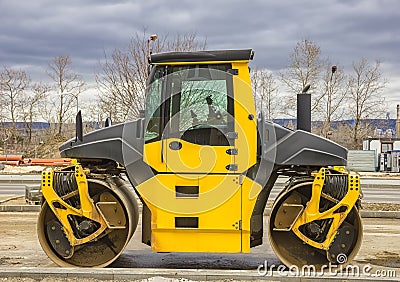 Stopped drum roller at the construction site. Editorial Stock Photo