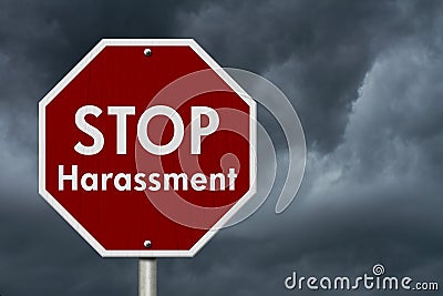 Stopping harassment Stop Sign with stormy clouds Stock Photo