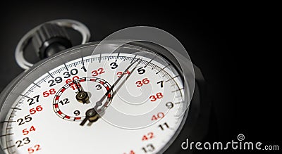 Stopwatch close up black dark background concept value of time Stock Photo