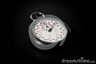 Stopwatch close up black dark background concept value of time Stock Photo