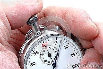 Stopwatch in a hand Stock Photo