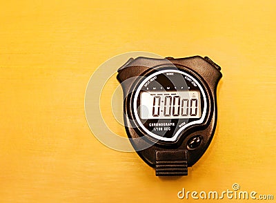 Stopwatch on wooden table Stock Photo