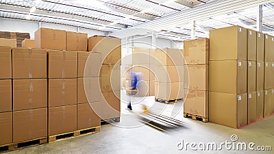 Storage of cardboard boxes in a large warehouse of an industrial Stock Photo