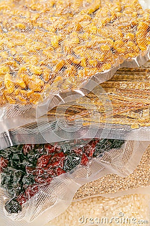 Storage of products in vacuum bags. food supply.Vacuuming products for long storage.Stocks of provisions.cereals, pasta Stock Photo