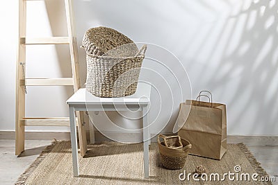Storage room. Wooden stairs, wicker baskets Stock Photo
