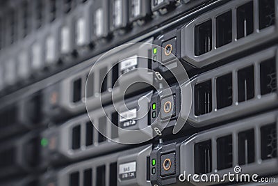 Storage server with many HDD disks inside rack in server room Stock Photo