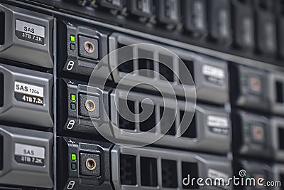 Storage server with many HDD disks inside rack in server room Stock Photo