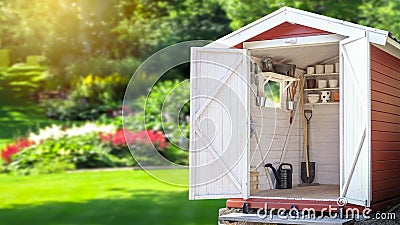 Storage shed filled with gardening tools. Stock Photo