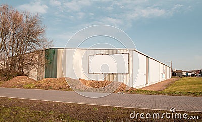 Storage warehouse with empty white title frame. Copy space Stock Photo