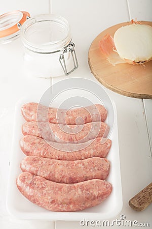 Store bought uncooked meat sausages Stock Photo