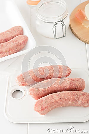 Store bought uncooked meat sausages Stock Photo