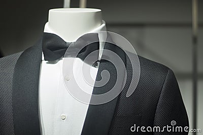Store dummy in dinner jacket and bow tie Stock Photo