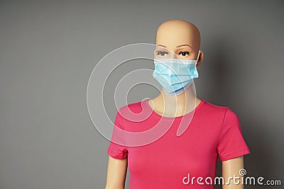 store window mannequin or display dummy wearing medical face mask Stock Photo