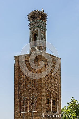 A storks nest caps the beautiful minaret at Chellah near Rabat in Morocco. Stock Photo