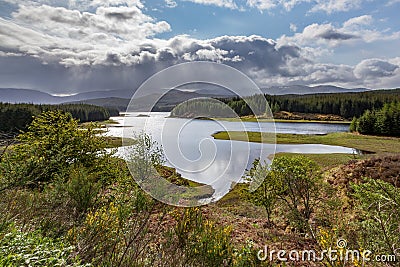 Storm approaching Loch Laggan in Scotland Stock Photo