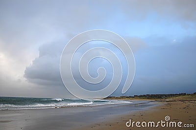 Storm cloud above beach Stock Photo