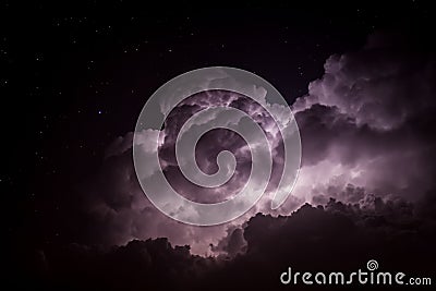 Storm Cloud Lit Up by Lightning at Night Stock Photo