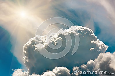 Storm Clouds in the blue sky and sun, background Stock Photo