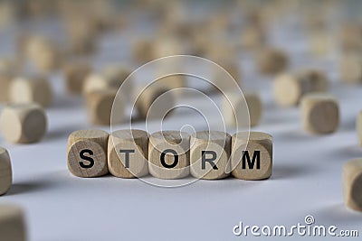 Storm - cube with letters, sign with wooden cubes Stock Photo