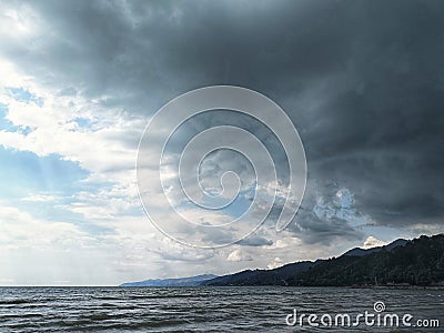 Storm front rolling over Te Puru Beach Stock Photo