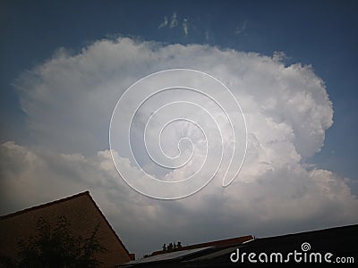 Stormcloud (Cumulonimbus) with strong updraft and well defined anvil Stock Photo