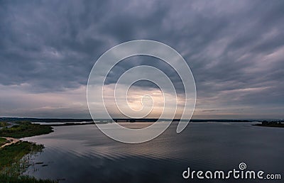 Stormy cloudy sky at sunset over the river Volga Stock Photo