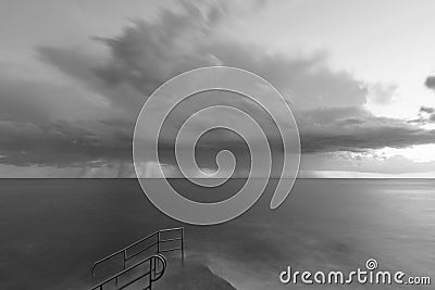 Stormy dramatic rainy seascape in Istria, Croatia. Black and white. Stock Photo