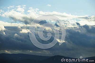 Stormy mountain cloudscape, rainy clouds nature Stock Photo