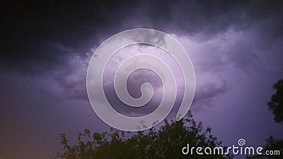 Stormy night sky lightning clouds Stock Photo