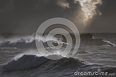 Stormy seascape with sunbeams Stock Photo