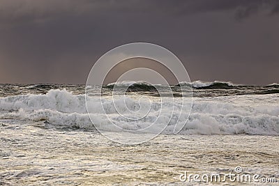 Stormy seascape at sunset Stock Photo