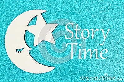 Story Time message with a wood moon and star Stock Photo