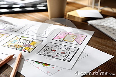 Storyboard with cartoon sketches at workplace. Pre-production process Editorial Stock Photo