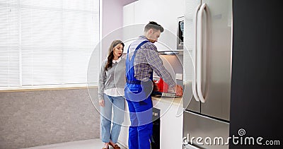 Stove Appliance Maintenance And Repair Stock Photo