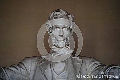 Straight on face dark portrait Of Abraham Lincoln at Memorial in Washington, DC in high contrast. Editorial Stock Photo