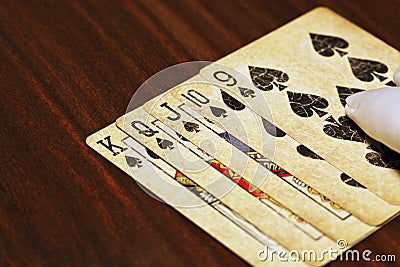 Straight flush on the wooden table Stock Photo