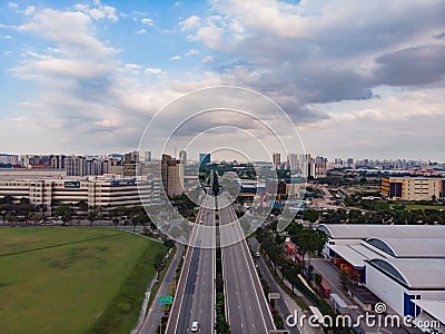 Straight highway leading to the city in Singapore Stock Photo